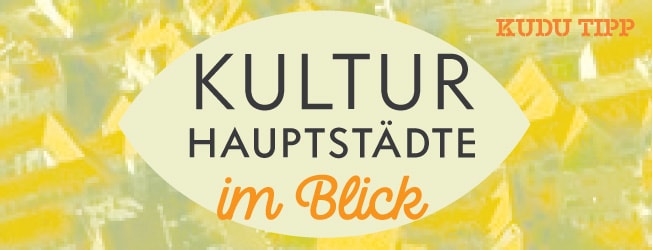 Gelb-grüne verschwommene Gestaltung, im Hintergrund sieht man Häuser einer Stadt, die Head lautet Kulturhauptstädte im Blick